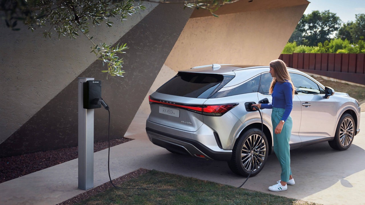 A person charging their Lexus using a Lexus HomeCharge